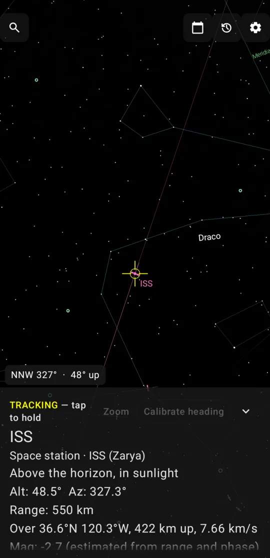The ISS crossing Draco in sunlight, with its path and live details